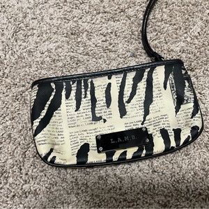 LAMB Zebra Newsprint Small Wristlet